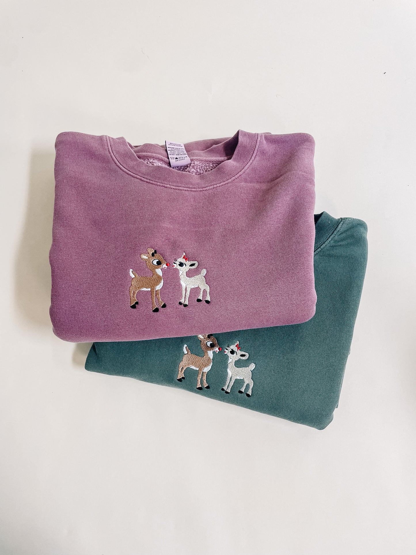 Rudolph and Clarise Adult Embroidered Sweatshirt
