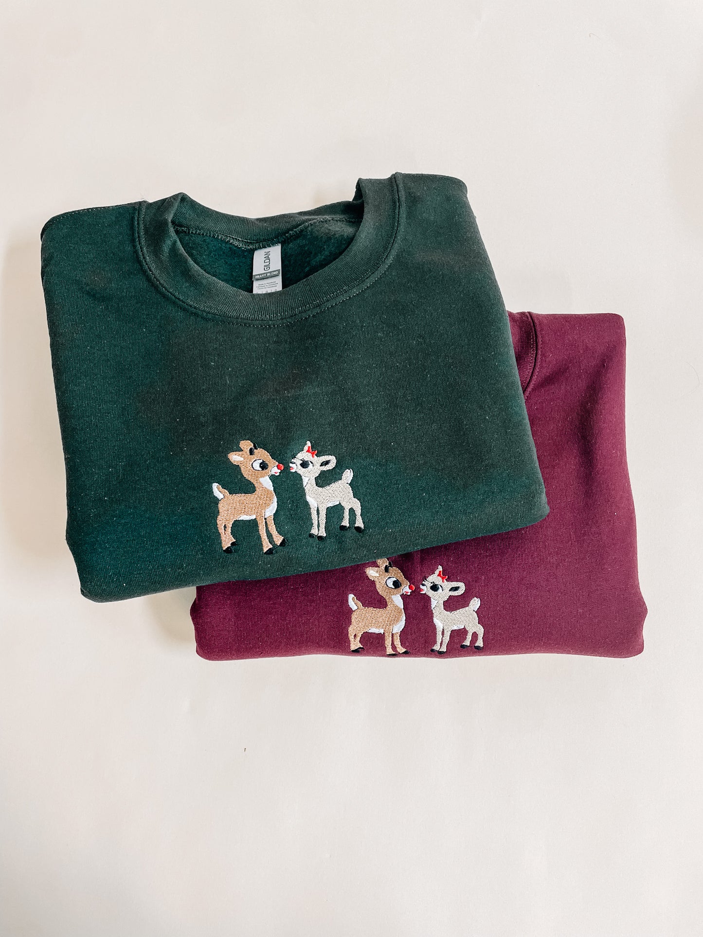 Rudolph and Clarise Adult Embroidered Sweatshirt